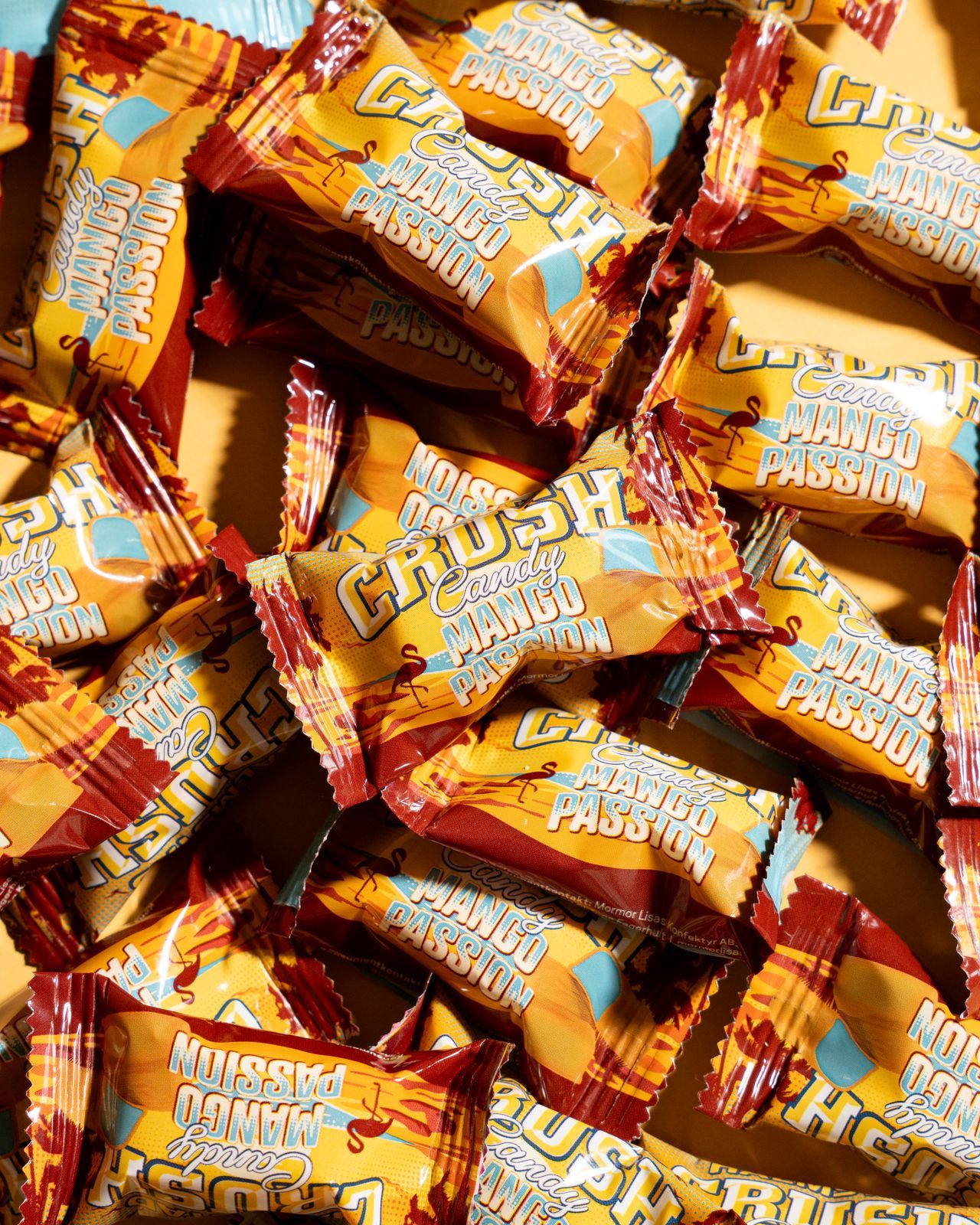 Halmstad Crush Candy Mango Passion i en hög