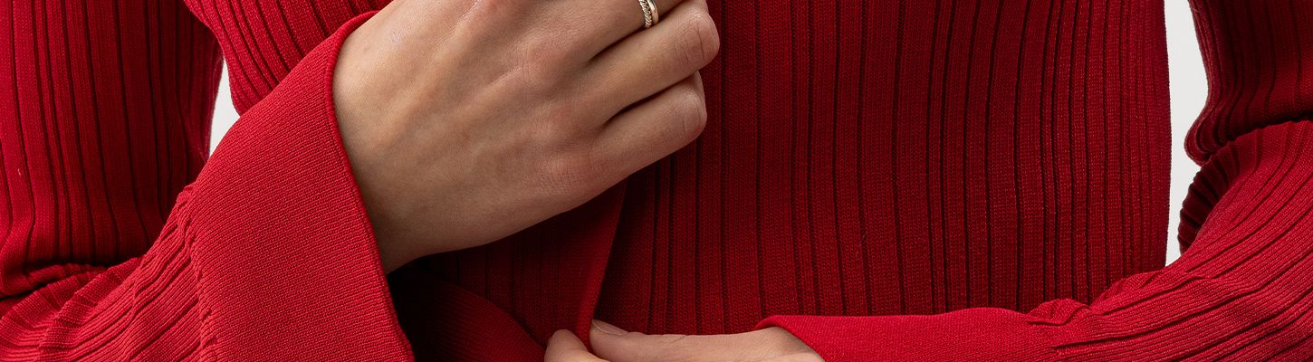 Stickad tröja i rött