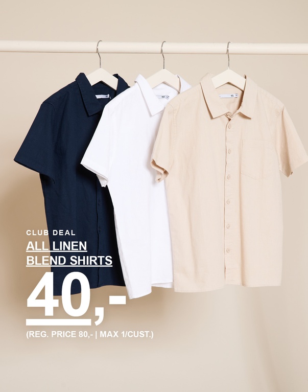 Tre kortærmede skjorter i hørblanding i mørkeblå, hvid og beige hænger på bøjler foran en lys baggrund. CLUB DEAL ALL LINEN BLEND SHIRTS 40,- (REG. PRICE 80,- | MAX 1/CUST.)