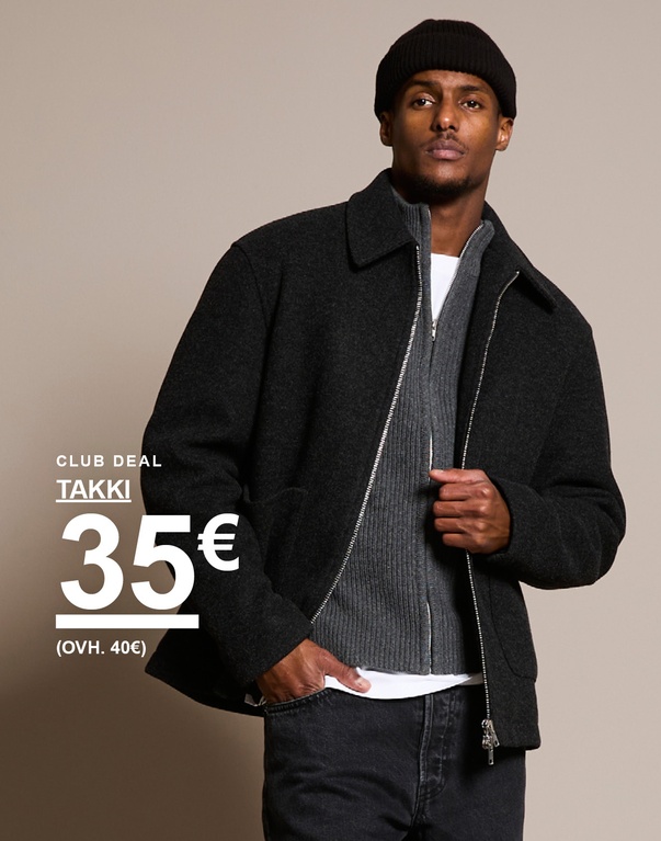 Mies tummassa takissa, jossa on vetoketju, harmaa neulepusero ja musta pipo. Teksti: Club Deal Takki 35 € (ovh. 40 €).