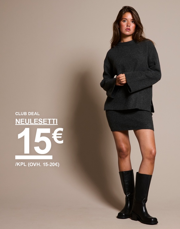 Tyttö antrasiitinharmaassa neulesetissä, jossa pusero ja hame. Kampanjateksti: 'CLUB DEAL, NEULESETTI 15€/OSA (OVH 15-20€)'.