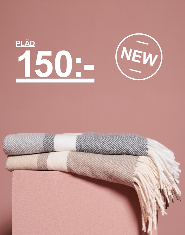 Pläd med fransar. Kampanjtext: 'PLÄD, 150: