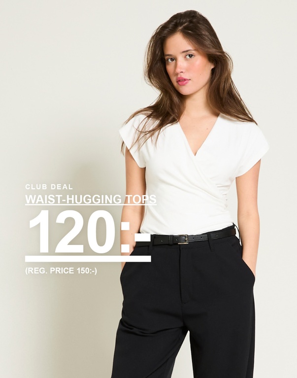 Vit midjekort topp med omlottskärning. Kampanjtext: "CLUB DEAL, WAIST-HUGGING TOPS, 120:- (ORD. PRIS 150:-)".