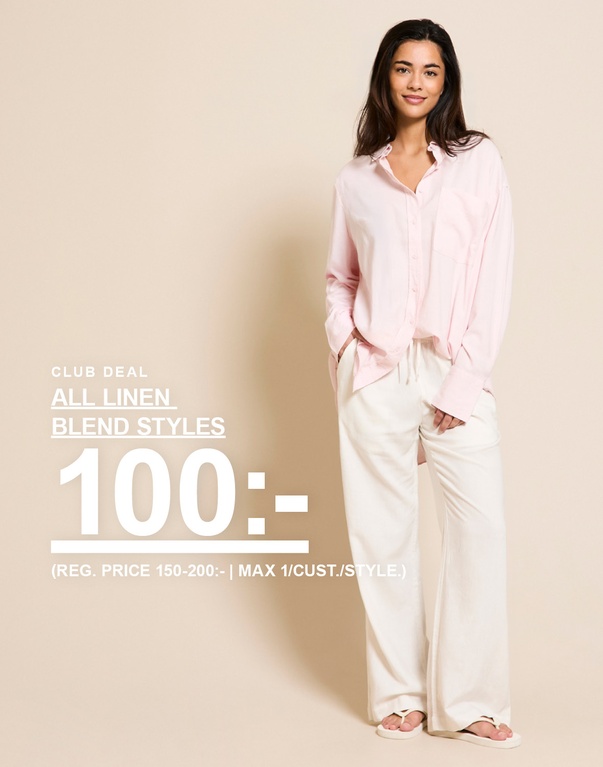 Två tjejer i linnemixade skjortor och byxor, en i ljusrosa skjorta och cremevita byxor och en i ljusblå skjorta och vita byxor. Kampanjtext: "CLUB DEAL, ALL LINEN BLEND STYLES, 100:- (ORD. PRIS 150-200:- | MAX 1/CUST./STYLE.)"