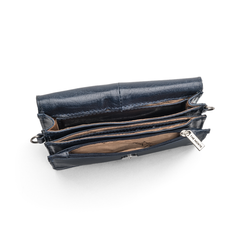 Väska clutch i skinn