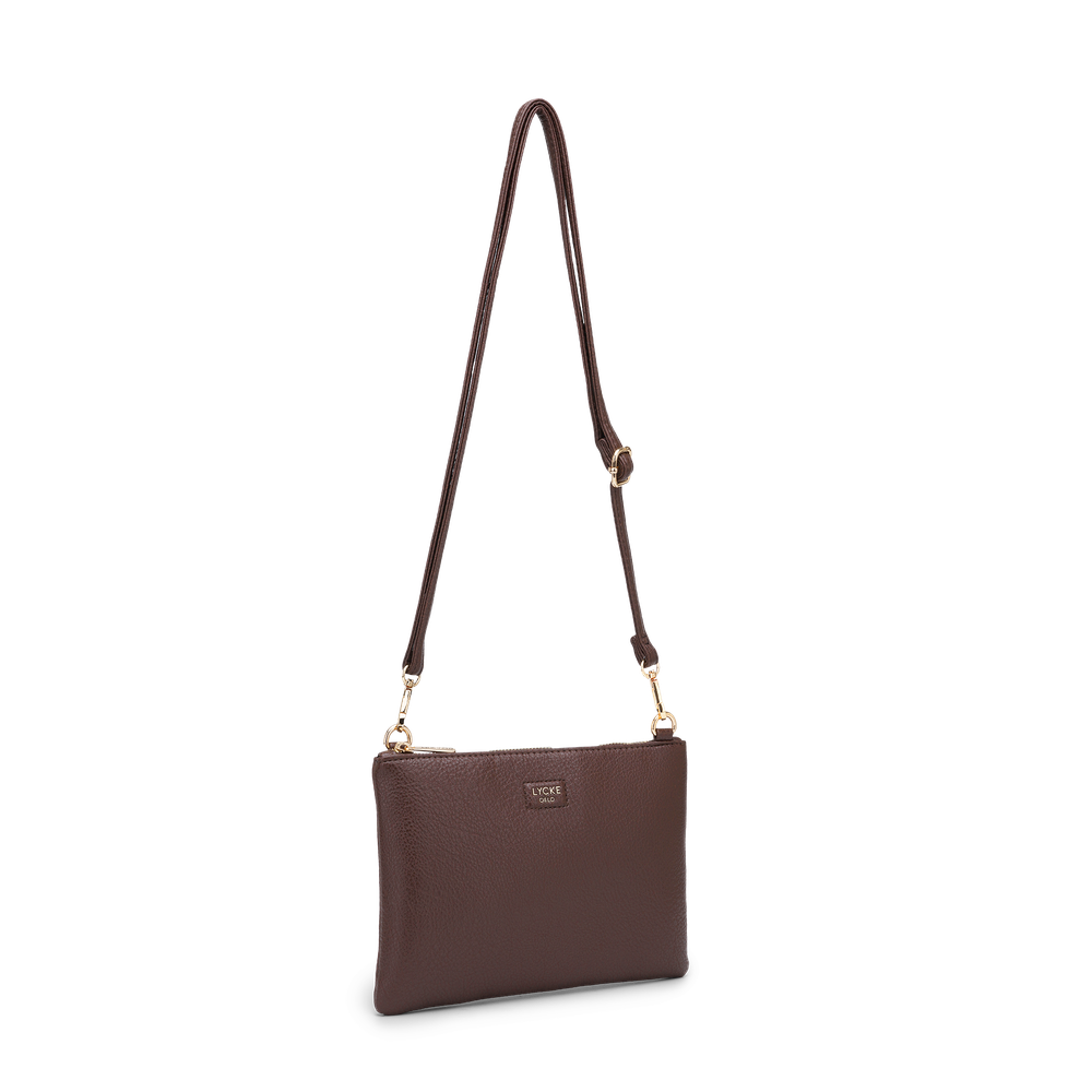 Alma clutch väska