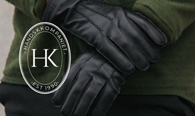 svarte skinnhandsker og vit logo Handskkompaniet