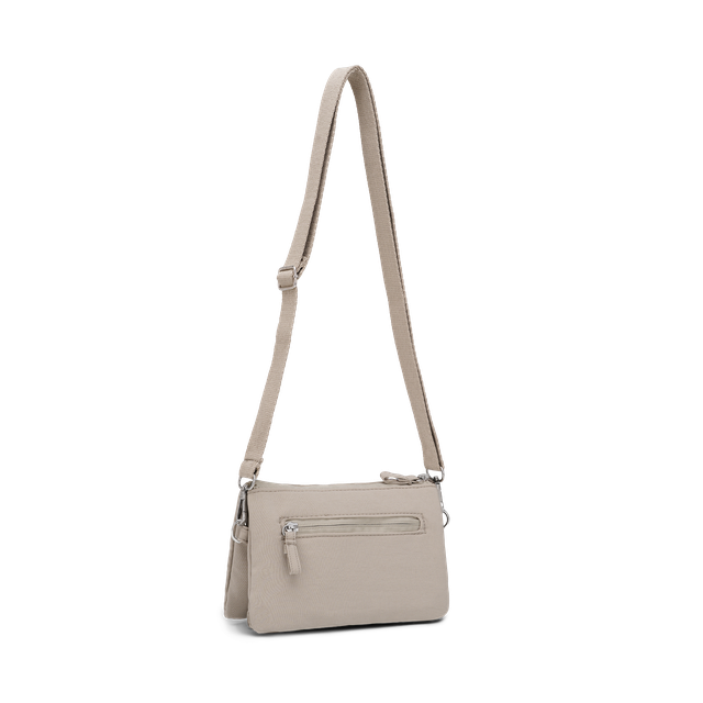 Lotta crossbody-veske med håndleddsrem
