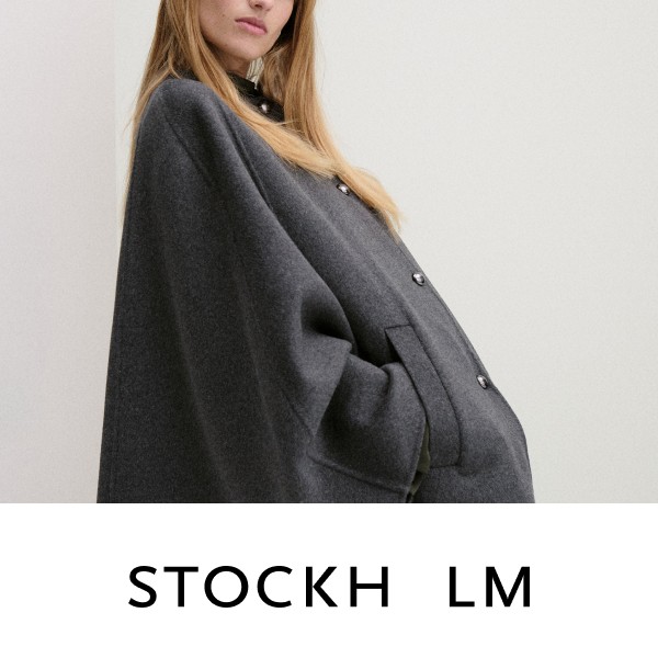 Modetøj til dame. Stockh lm. Grå uldkappe i stilrent design.