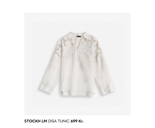 Hvid langærmet bluse med skjortekrave samt detaljer i blonder fra Stockholm Studio hos MQ.