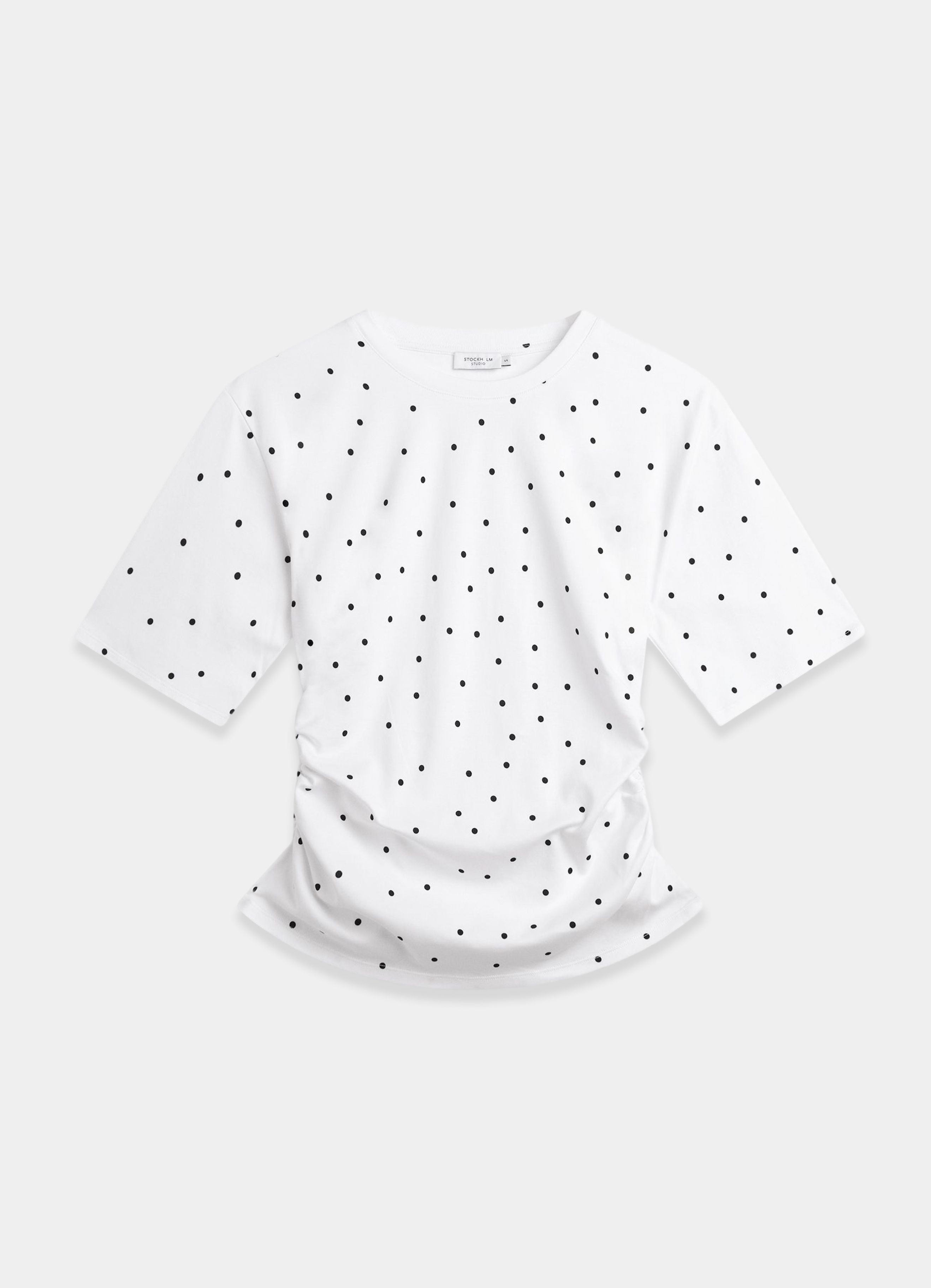 Valkoinen naisten toppi mustilla pilkuilla MQ:lta.