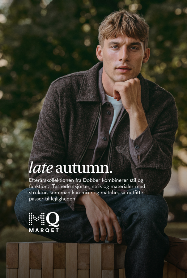 Gråbrun overshirt med lynlås, matchet til et par mørkeblå jeans.