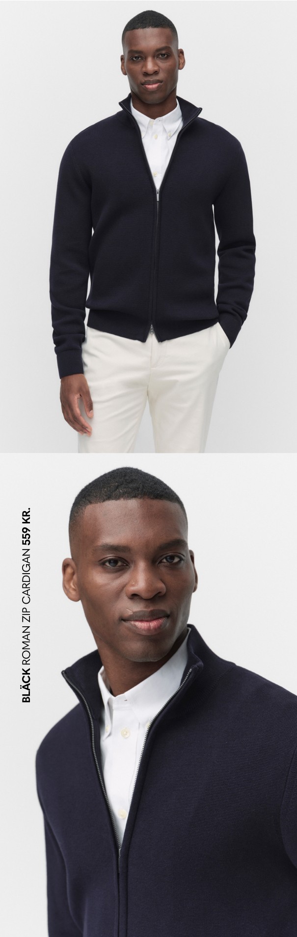 Et sæt tøj til herre med hvide chinos, hvid skjorte og en mørkeblå cardigan med lynlås.