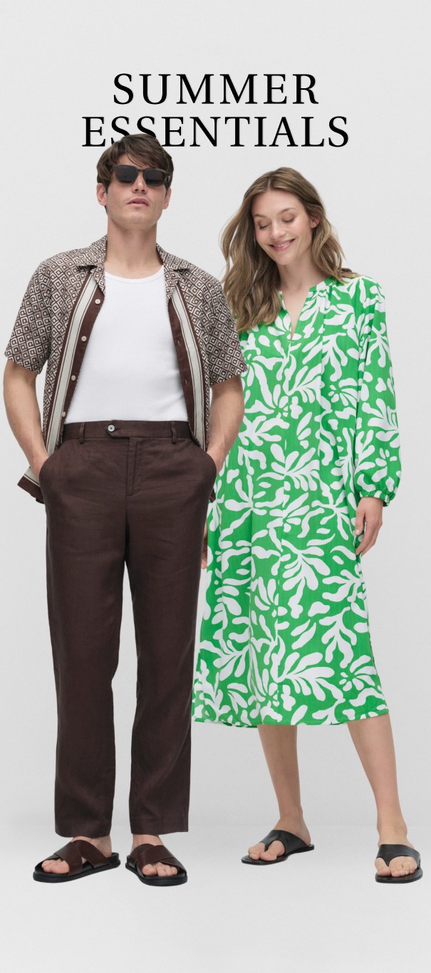 Mies, jolla on ruskeat pellavahousut ja ruskea kuviollinen lyhythihainen paita, ja nainen, jolla on tuulinen kesämekko, jossa on vihreä kuvio.