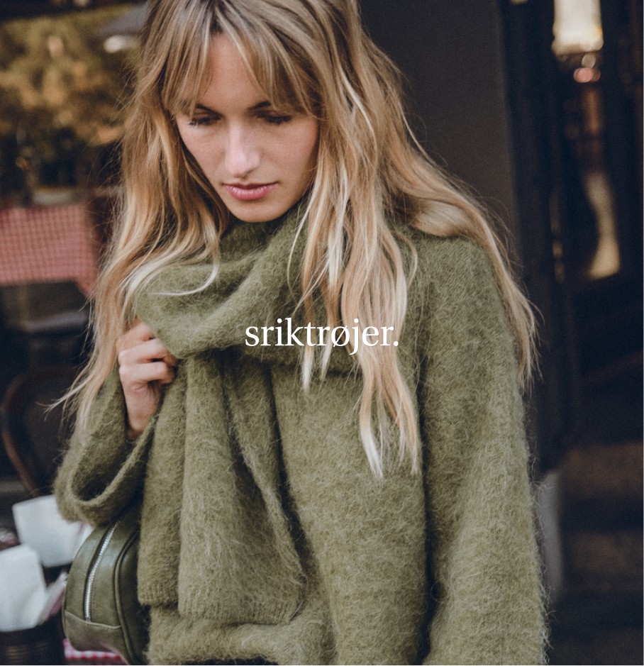 Grøn striktrøje til dame.