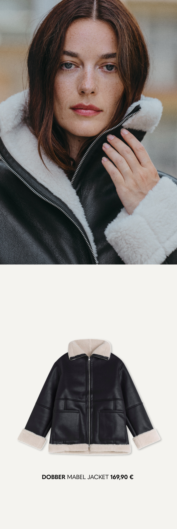 Lämmin takki, jossa on valkoinen vuori ja musta keinonahka.