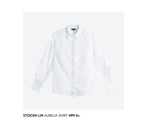 Hvid skjortebluse med flæser.