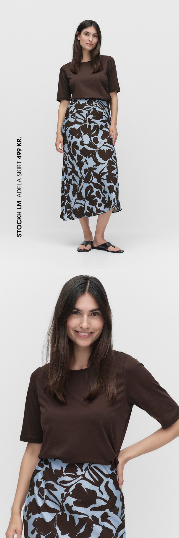 Lyseblå nederdel med mørkebrunt blomstermønster og en mørkebrun t-shirt i god kvalitet.