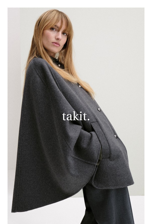 Harmaanpilkullinen naisten takki. Klassinen ja tyylikäs päällysvaate.