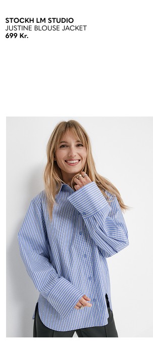 Siniviirinen naisten paita kivillä