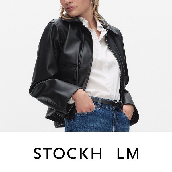 Vaatteita merkiltä Stockh lm. Musta takki keinonahasta.