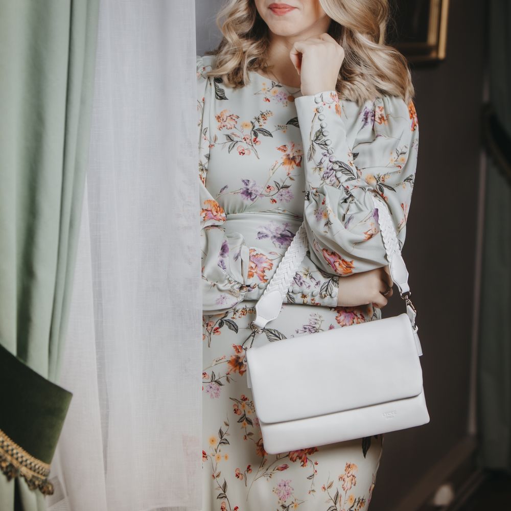 Skulderveske i crossover-modell