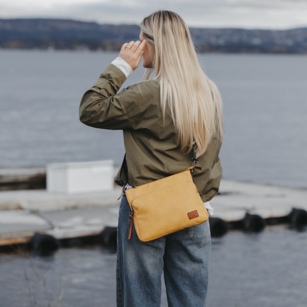 Skulderveske i crossover-modell