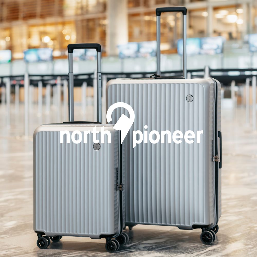 to north pioneer kofferter, Superb i sølvfarge på flyplass