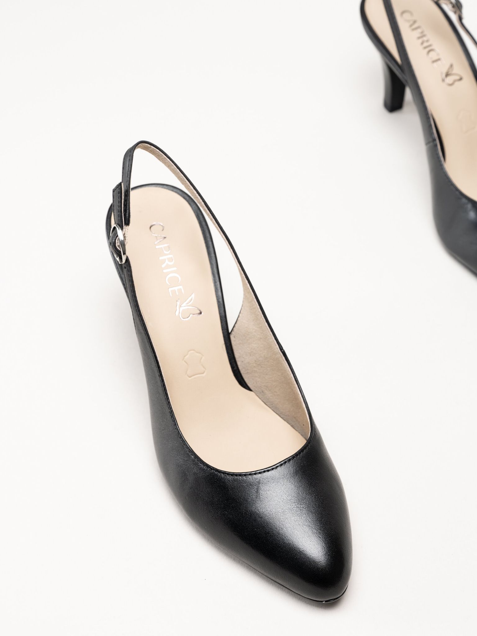 Caprice - Svarta slingback pumps i skinn