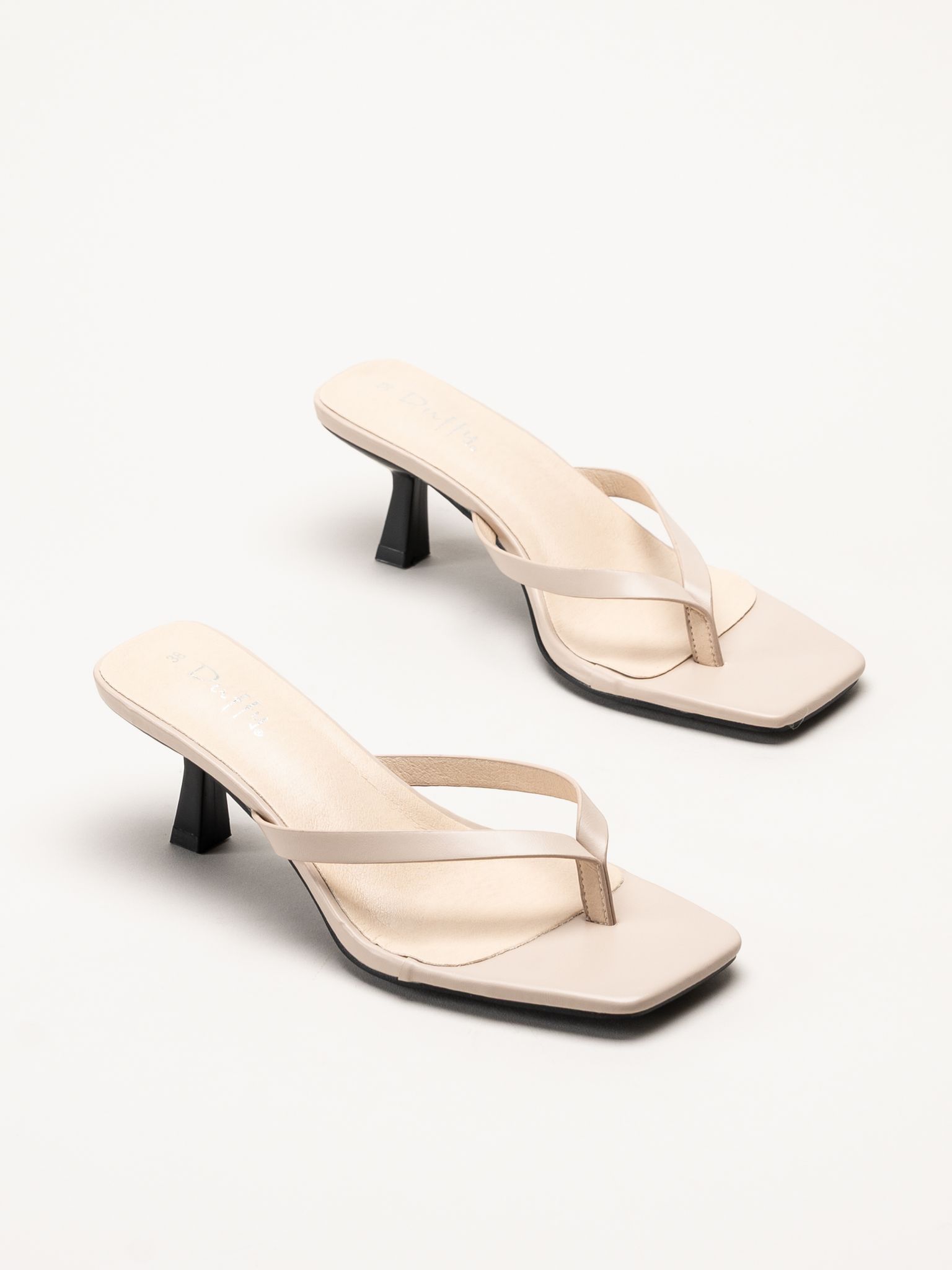 Duffy - Beige mules med tårem