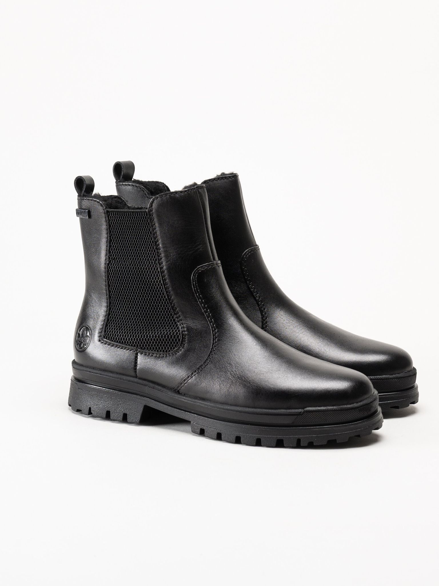 Rieker - Svarta fodrade boots med broddar