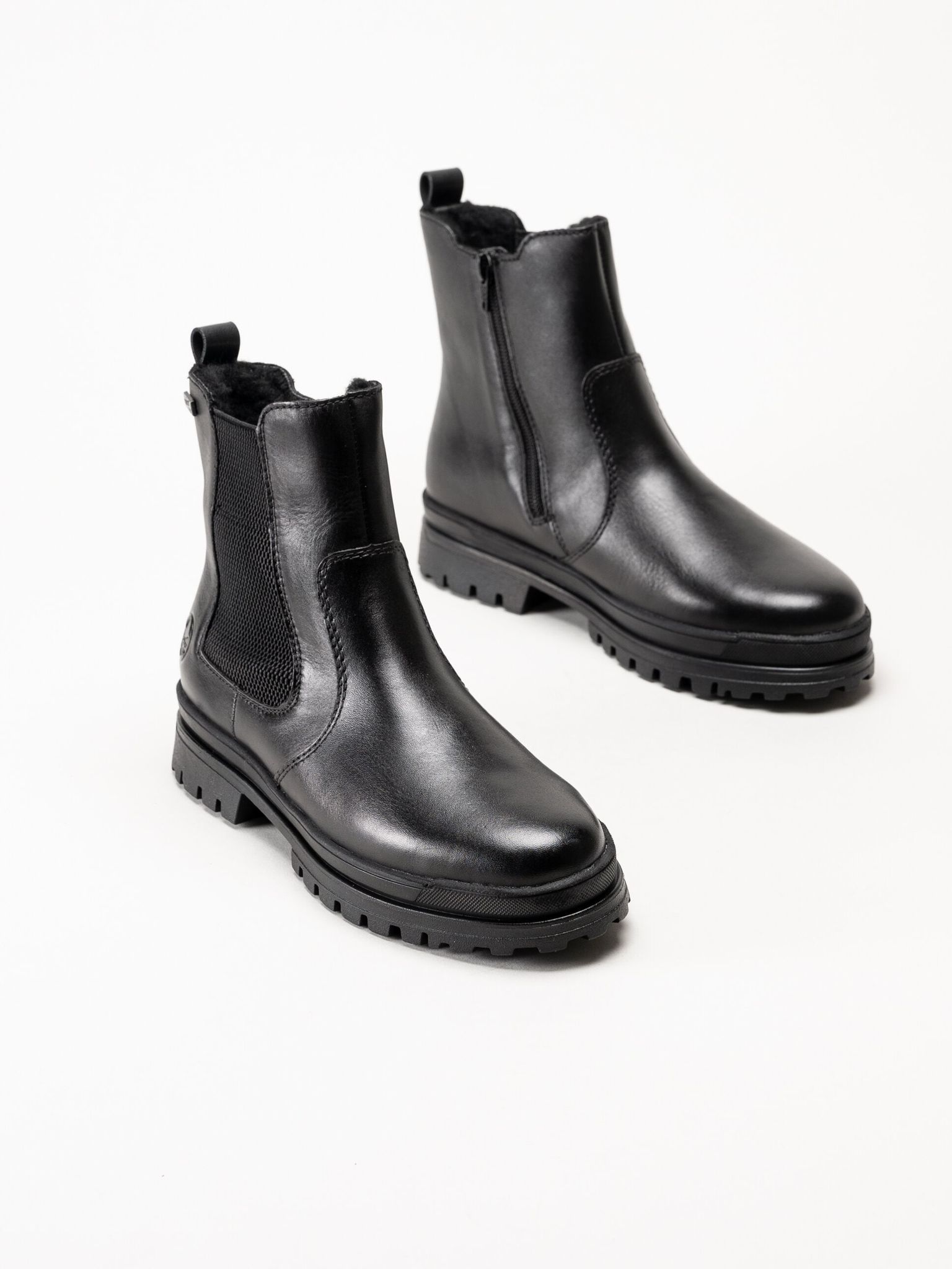 Rieker - Svarta fodrade boots med broddar
