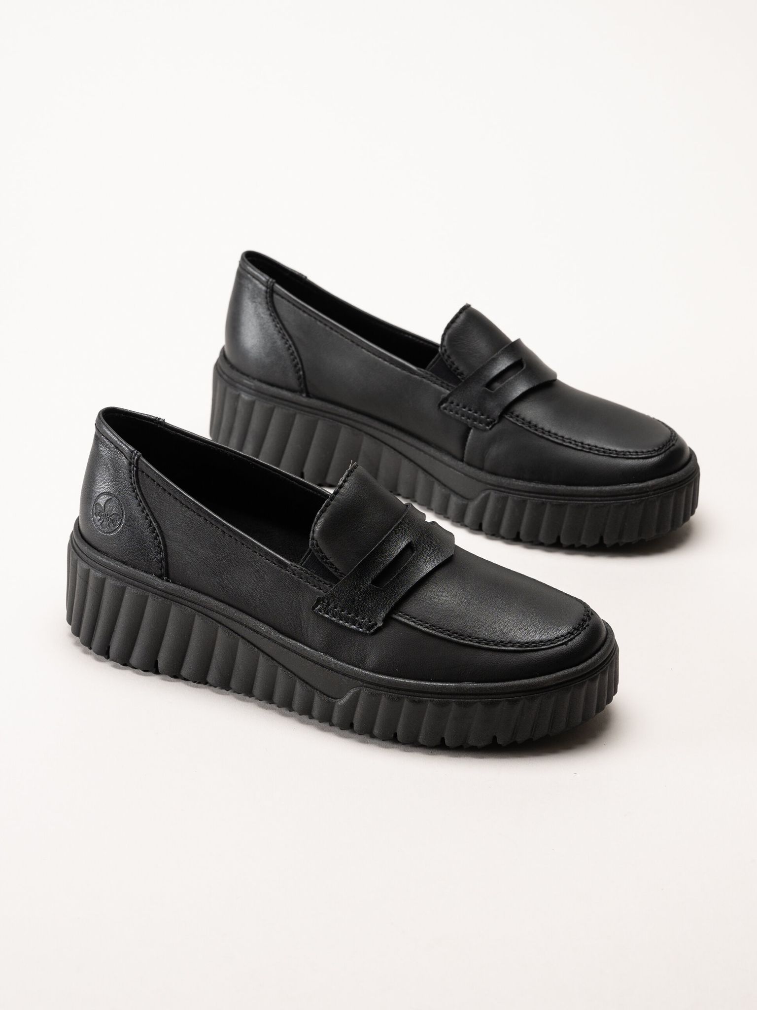 Rieker - Svarta loafers i skinn