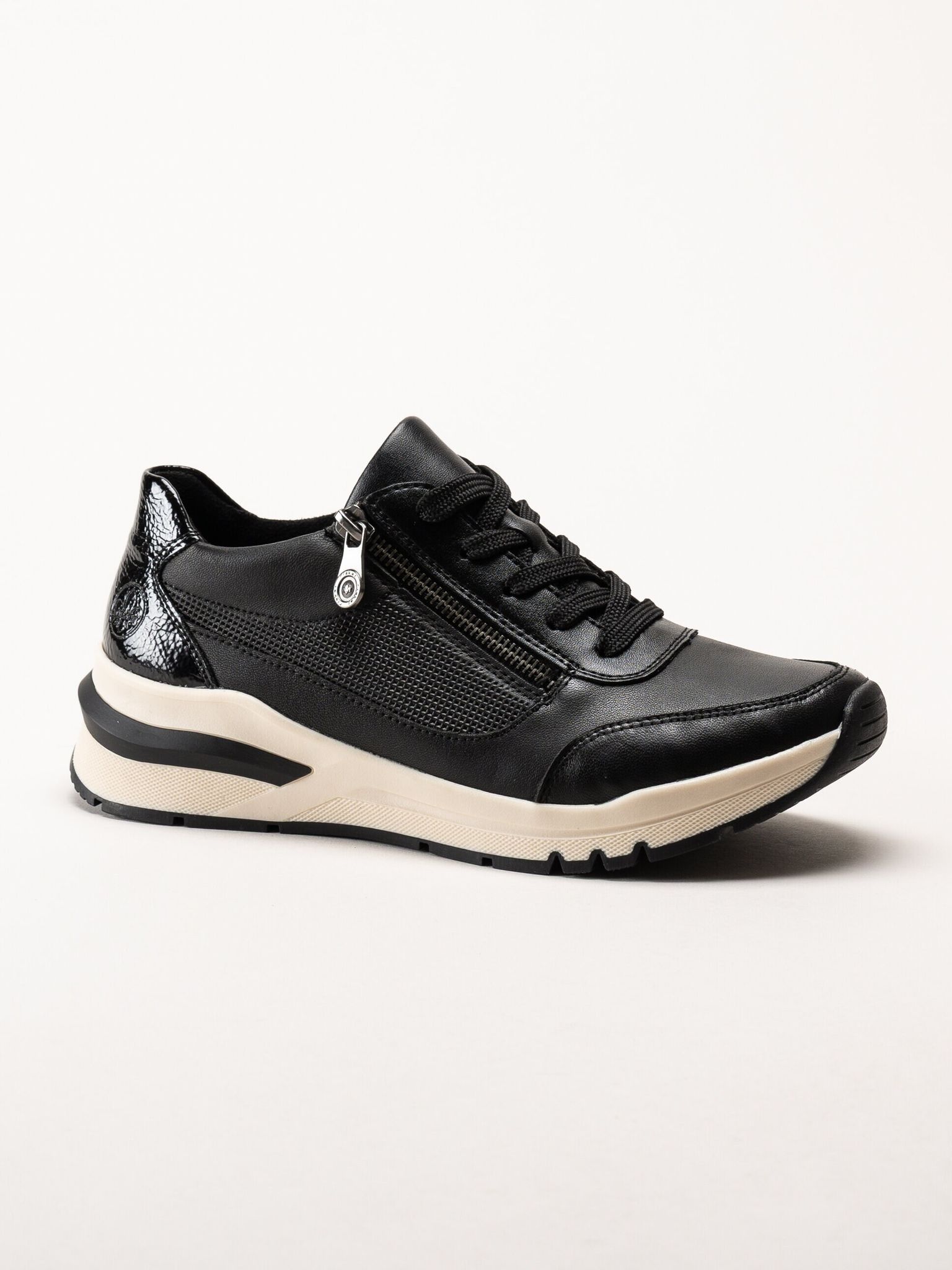 Rieker - Svarta promenadsneakers i skinn