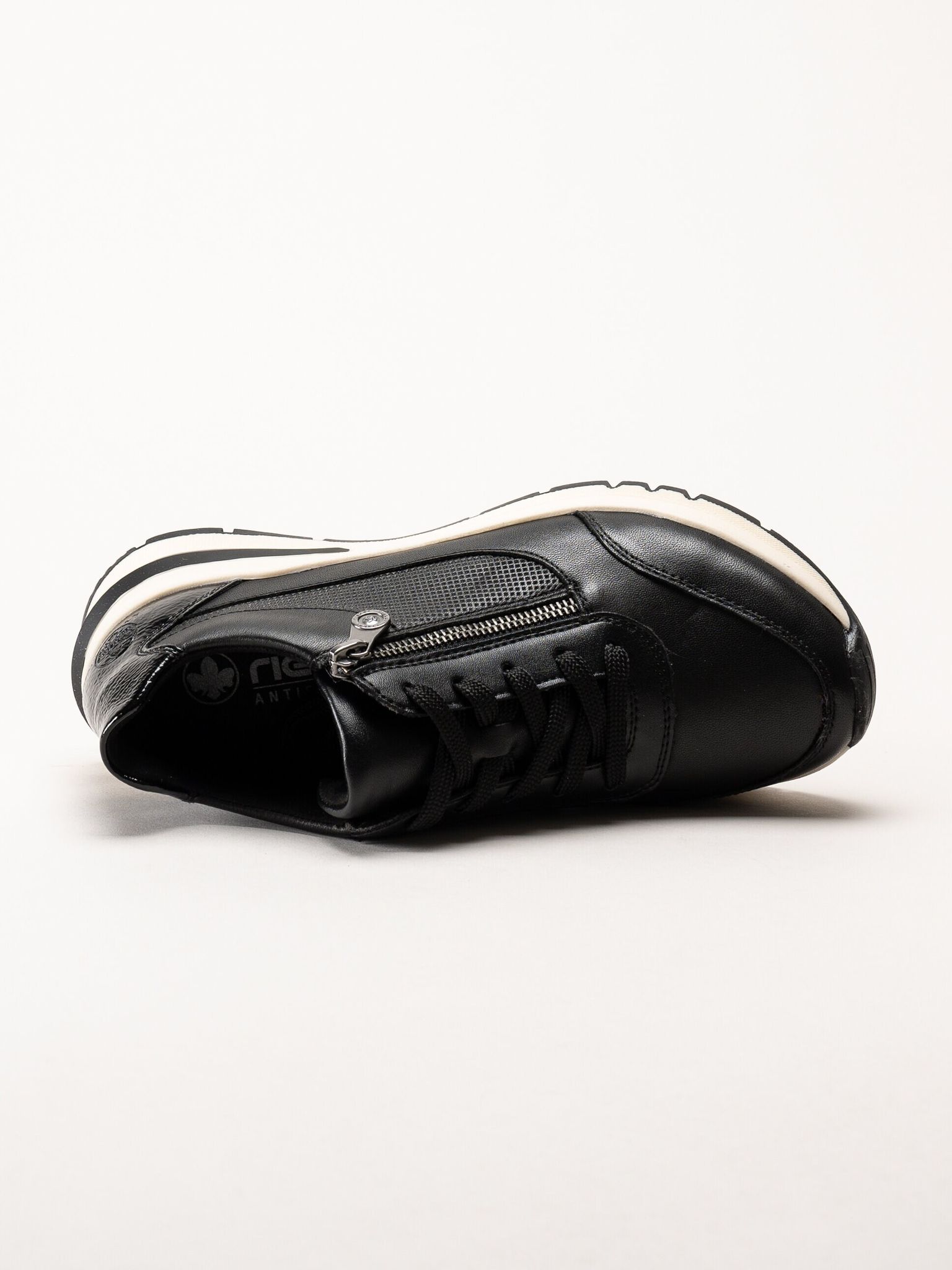 Rieker - Svarta promenadsneakers i skinn