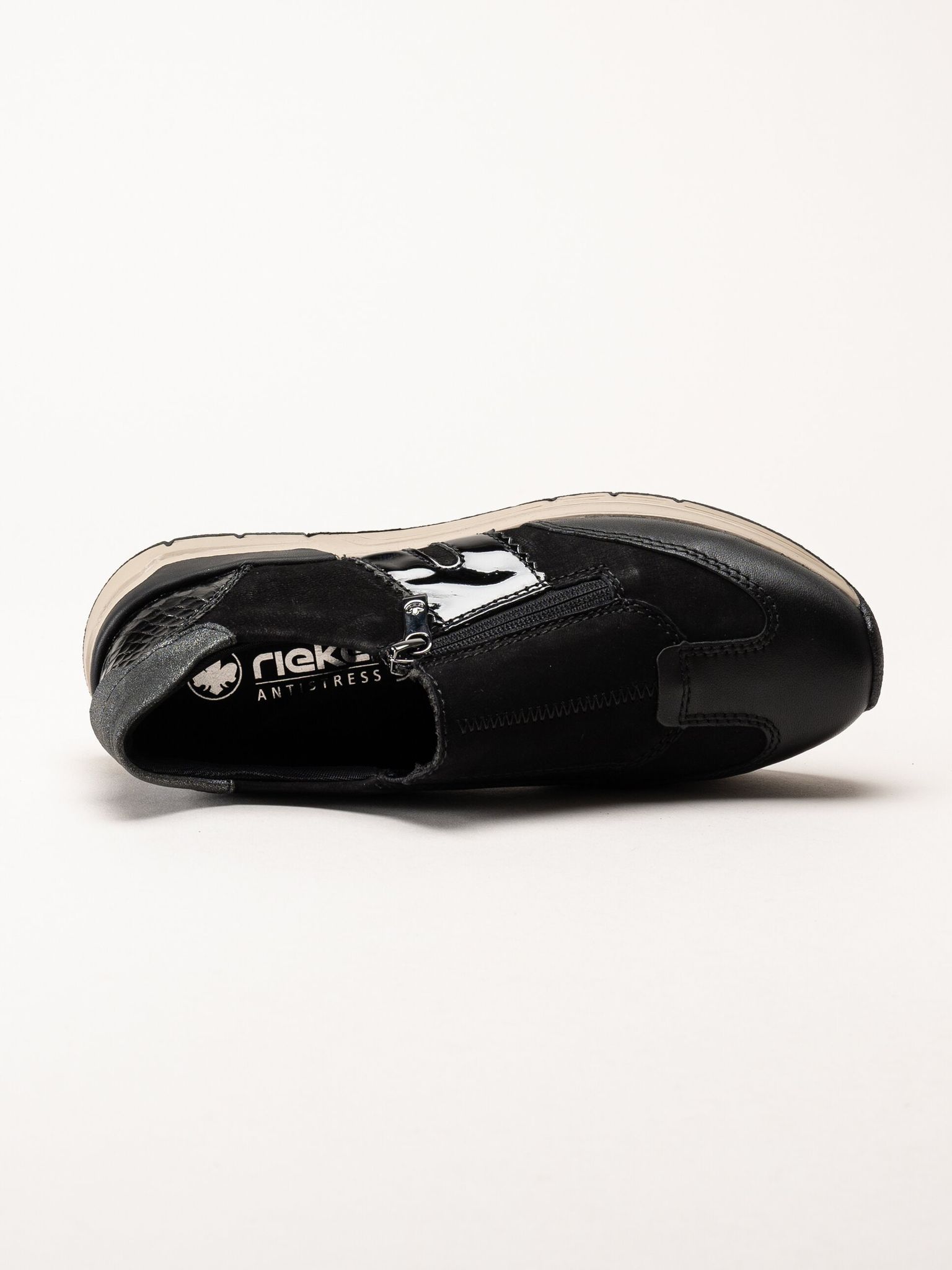 Rieker - Svarta promenadsneakers i nubuck och skinn