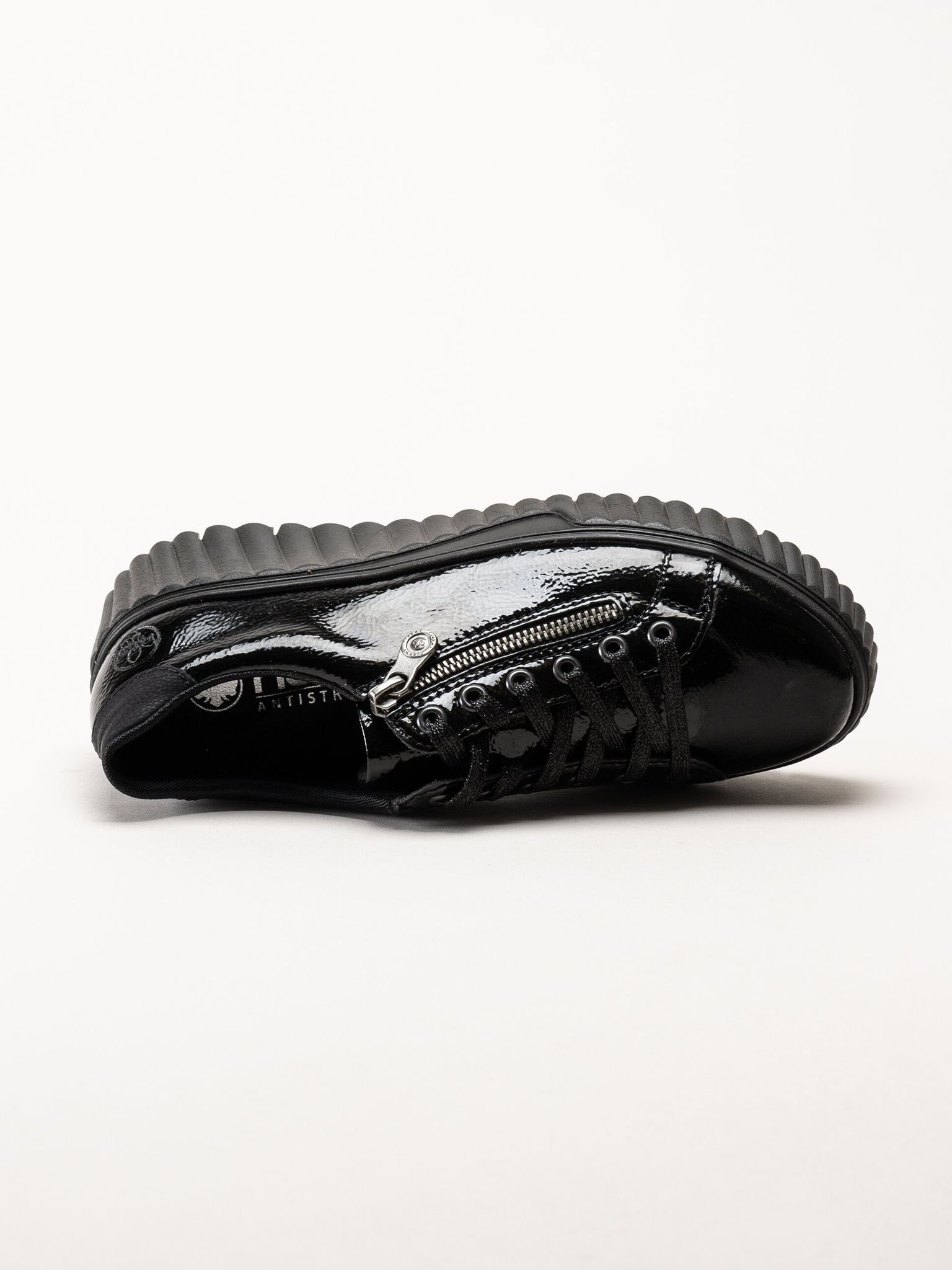 Rieker - Svarta platåsneakers i skinn-lack