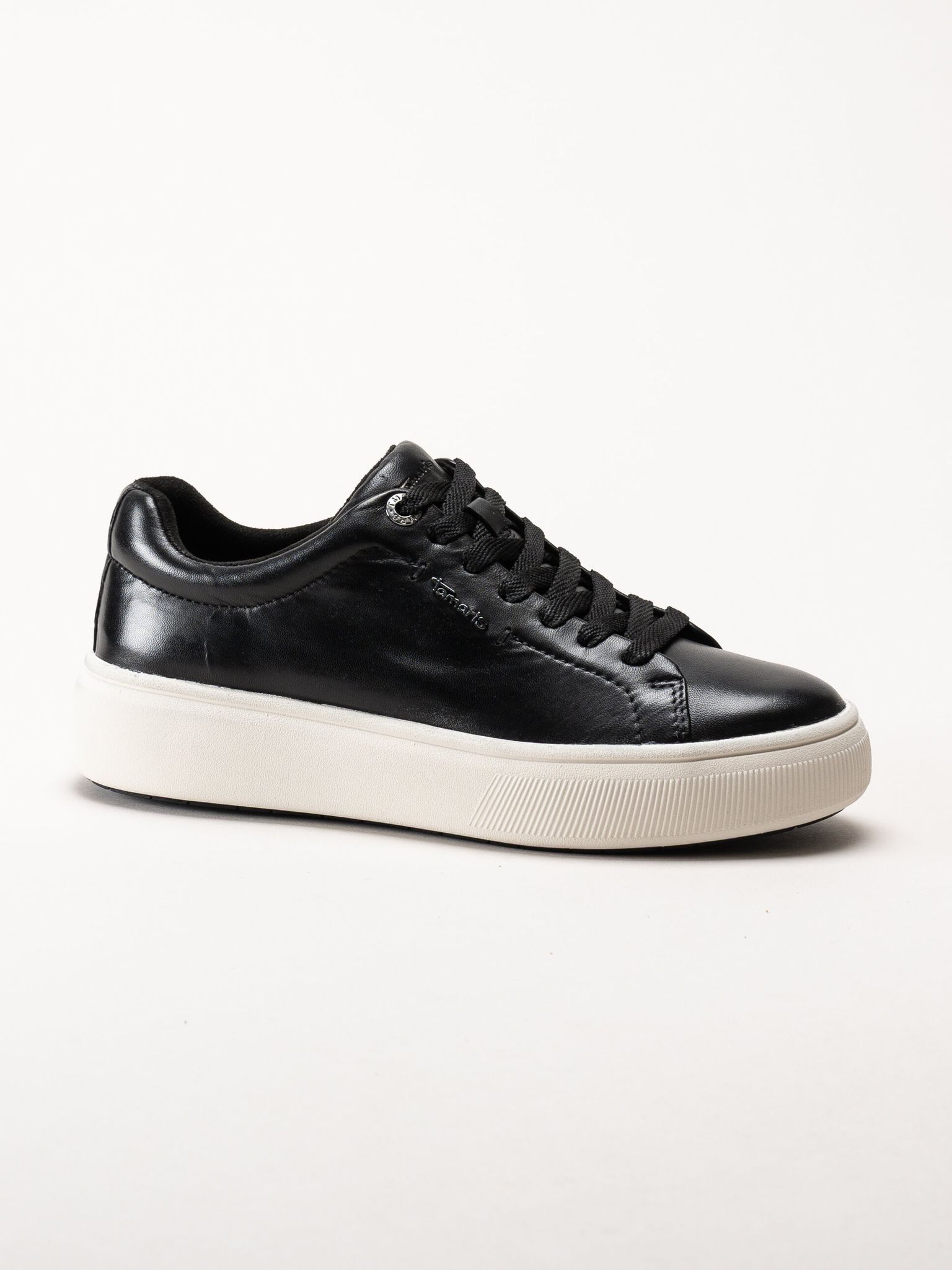 Tamaris - Svarta sneakers i skinn med platåsula