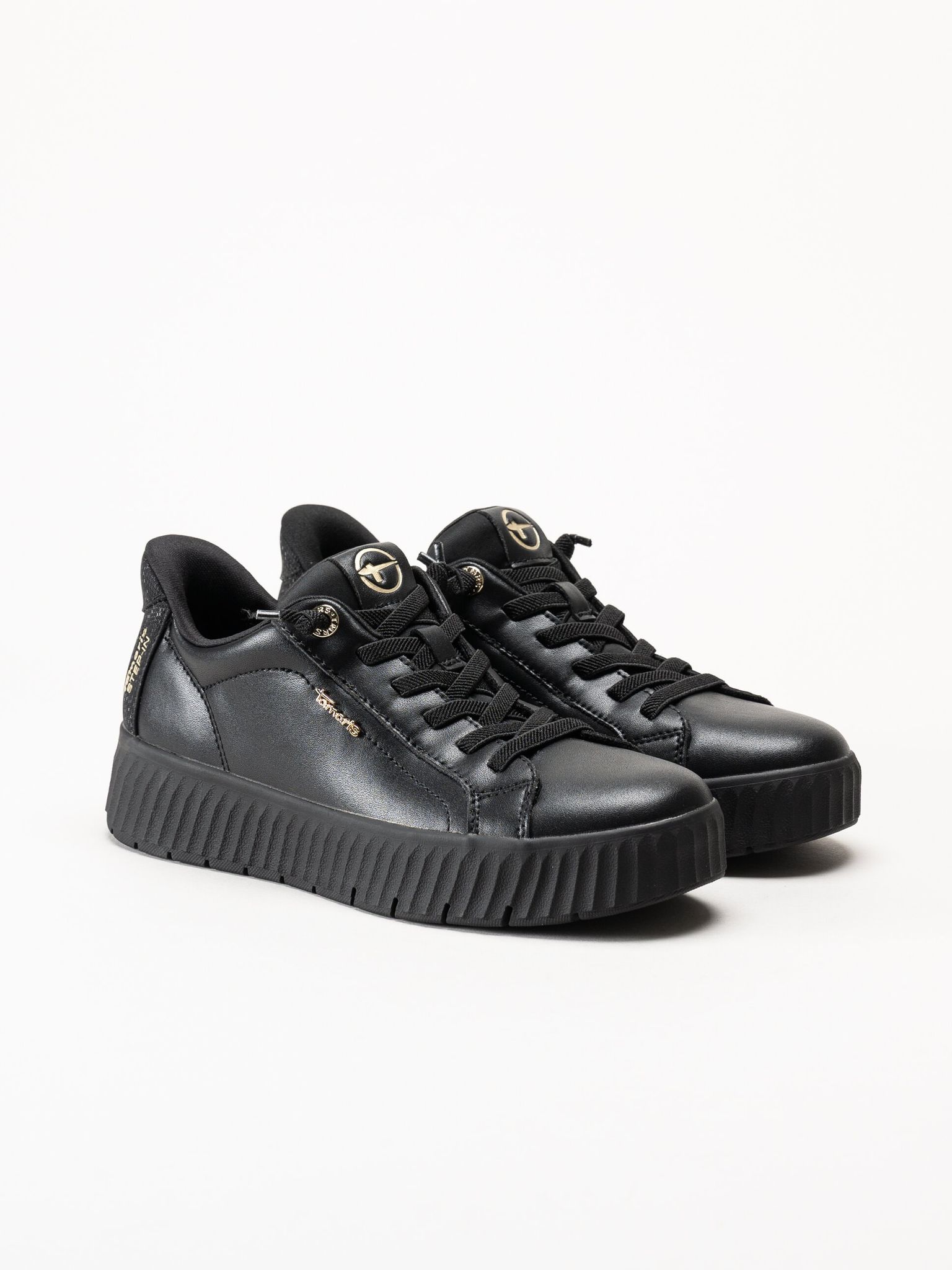 Tamaris - Svarta sneakers i skinn
