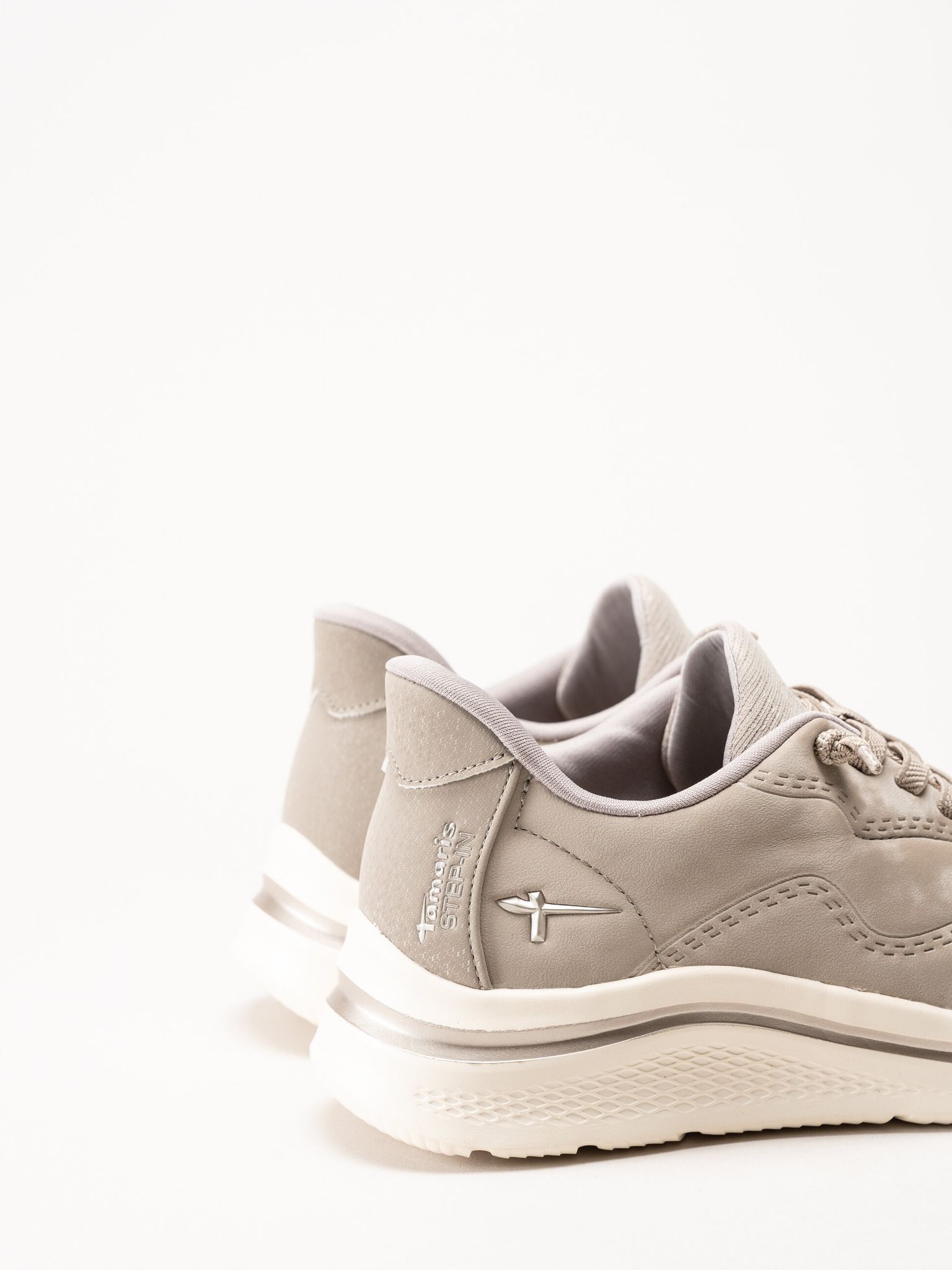 Tamaris Comfort - Beige sneakers i skinnimitation