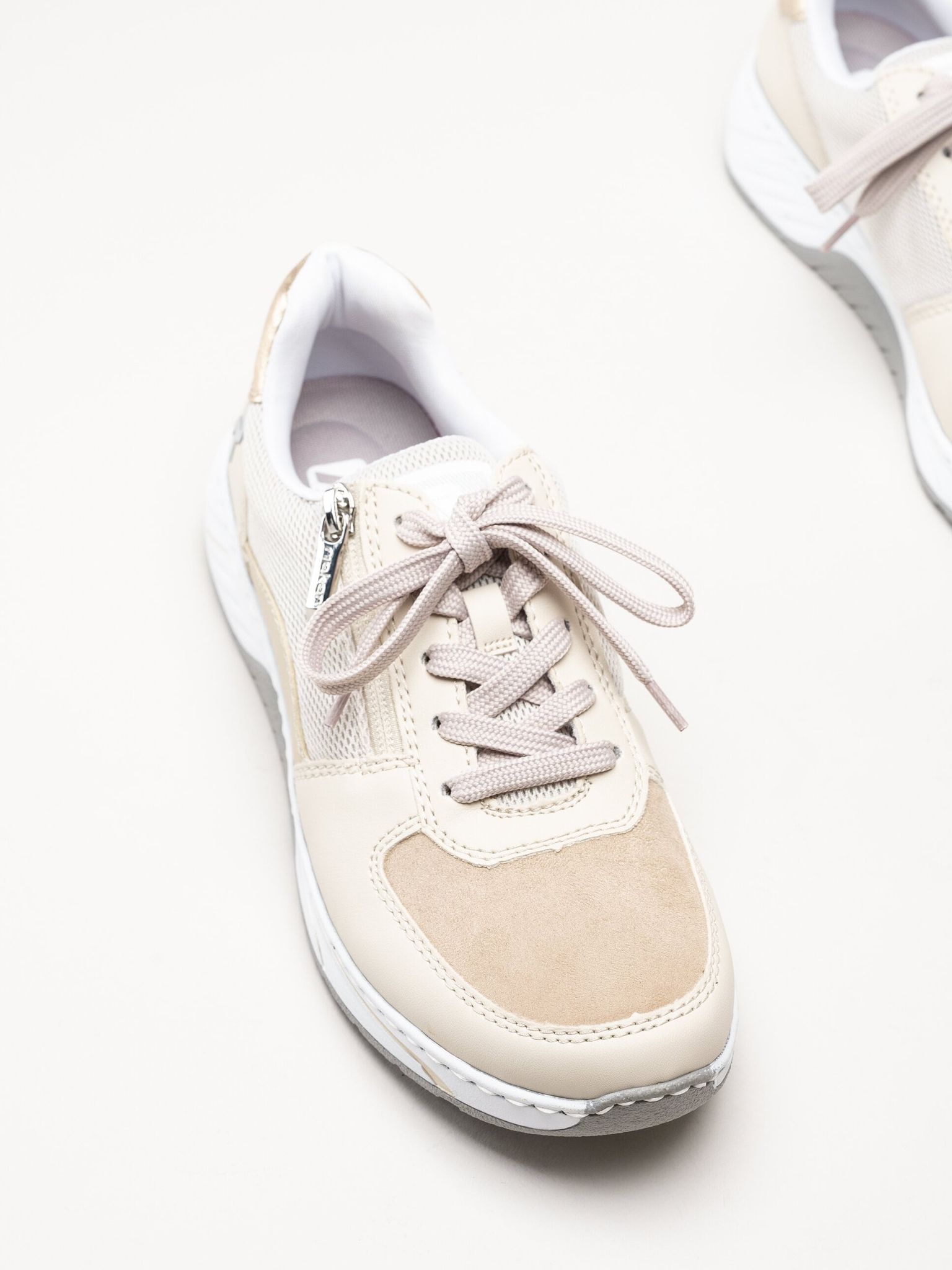 Rieker - Beige sneakers i skinnimitation