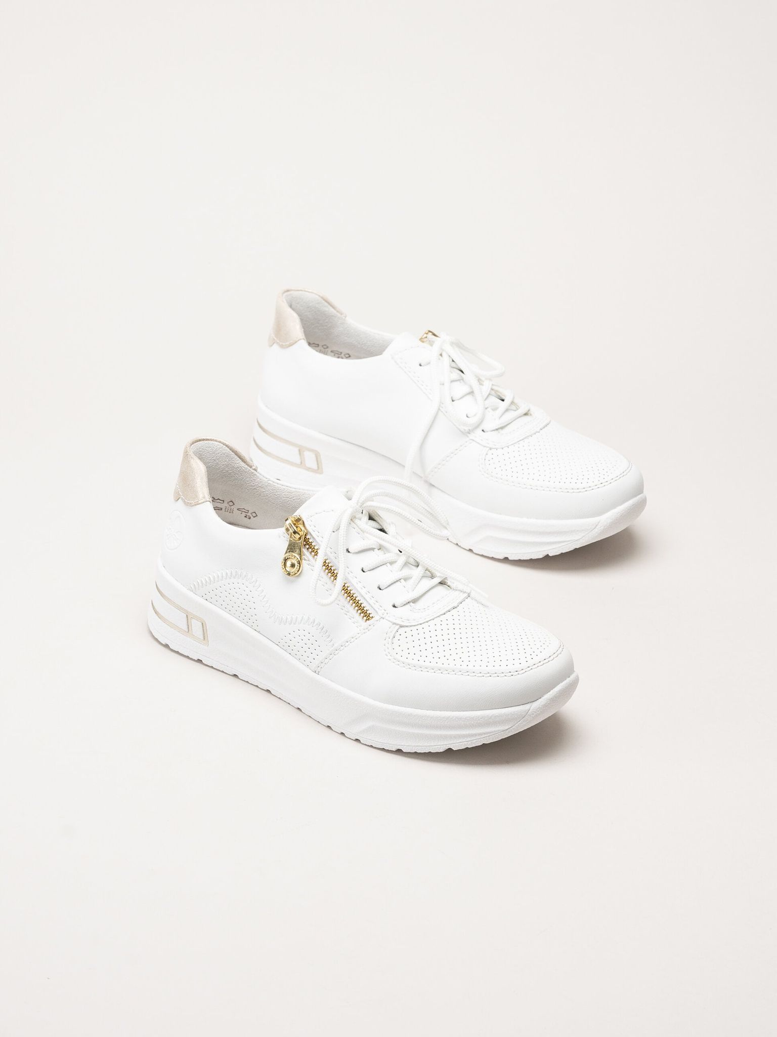 Rieker - Vita sneakers i skinnimitation