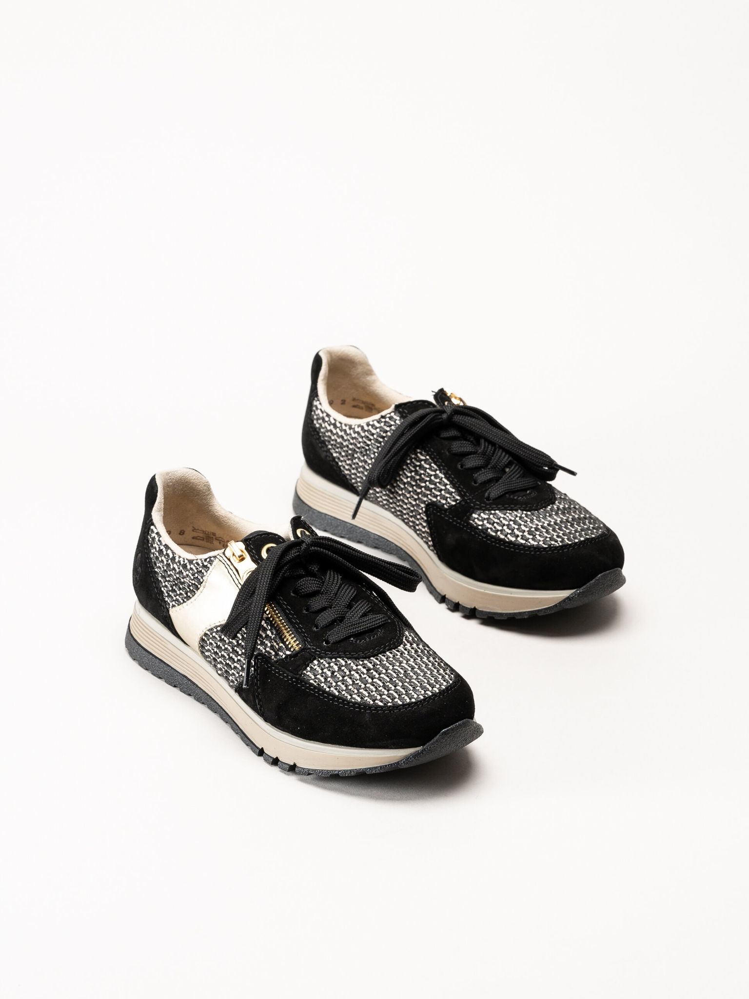 Rieker - Svarta sneakers i mocka och textil