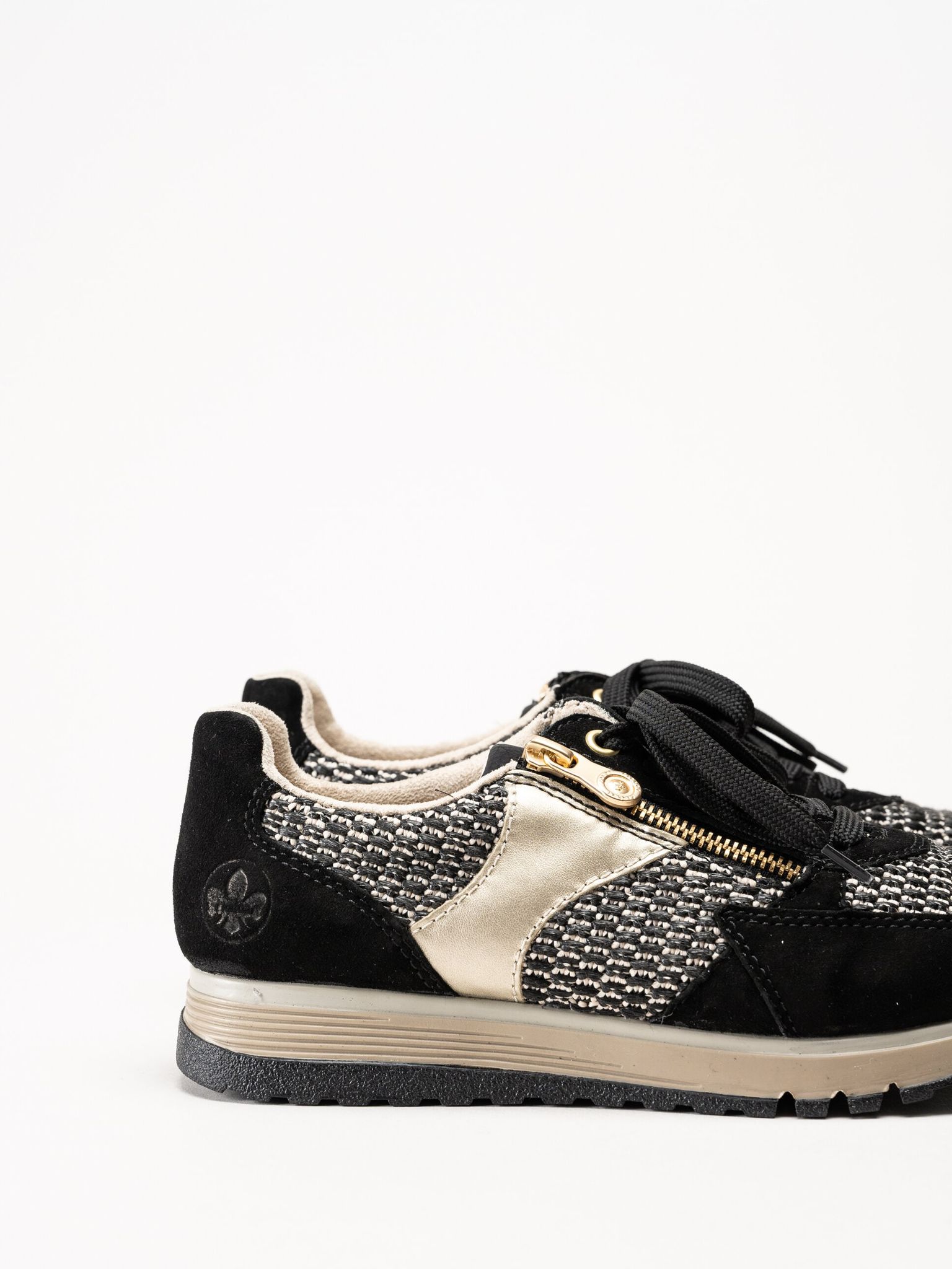 Rieker - Svarta sneakers i mocka och textil