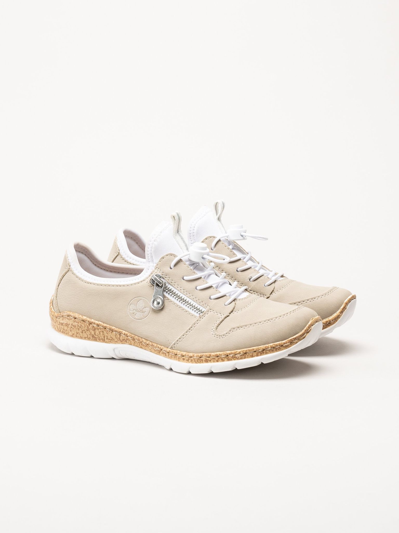 Rieker - Beige sneakers i skinnimitation