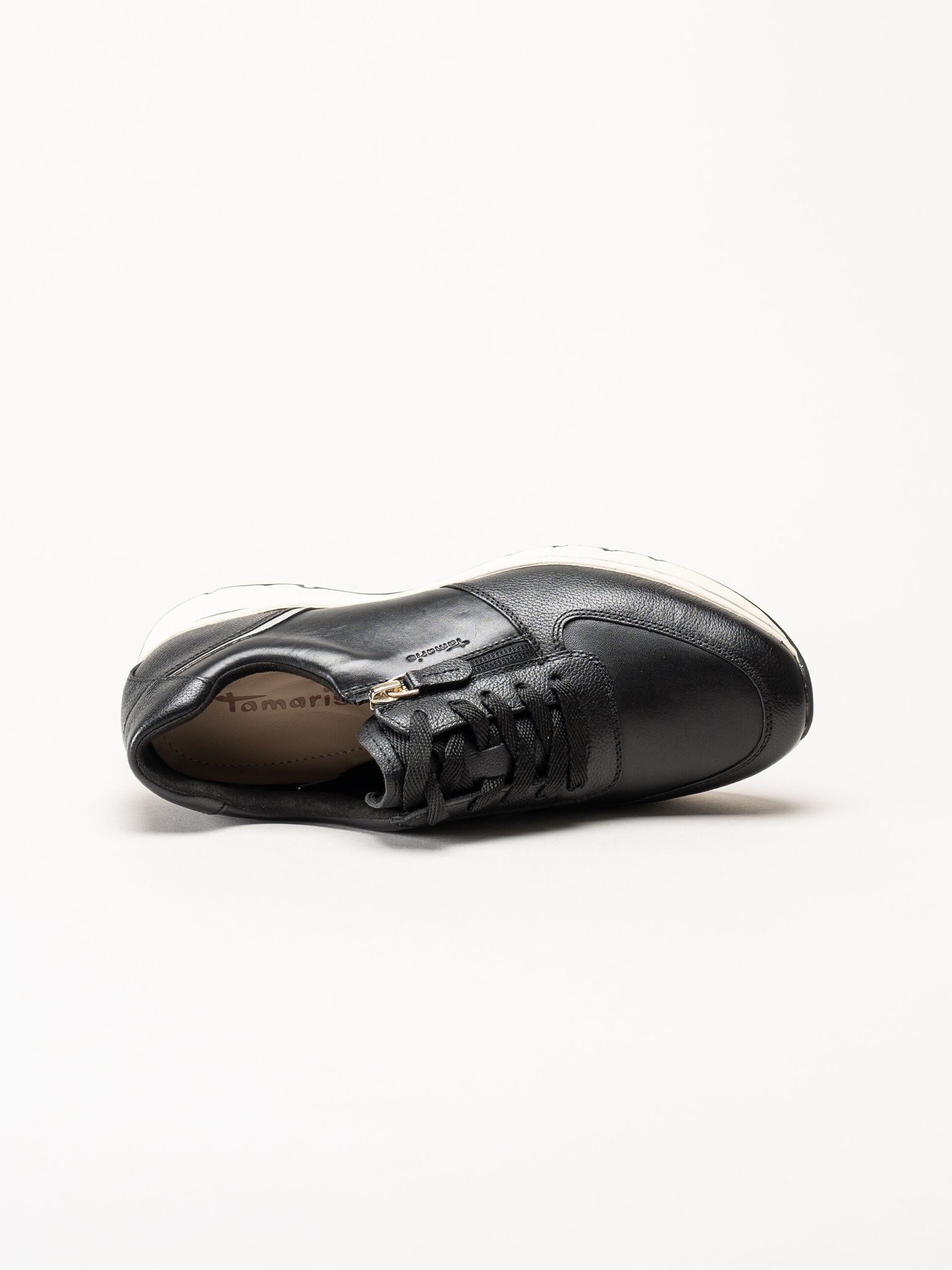 Tamaris - Svarta sneakers i skinn