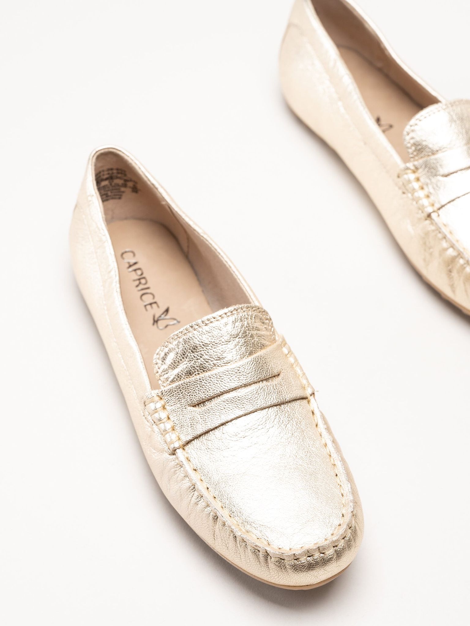 Caprice - Guldiga loafers i skinn