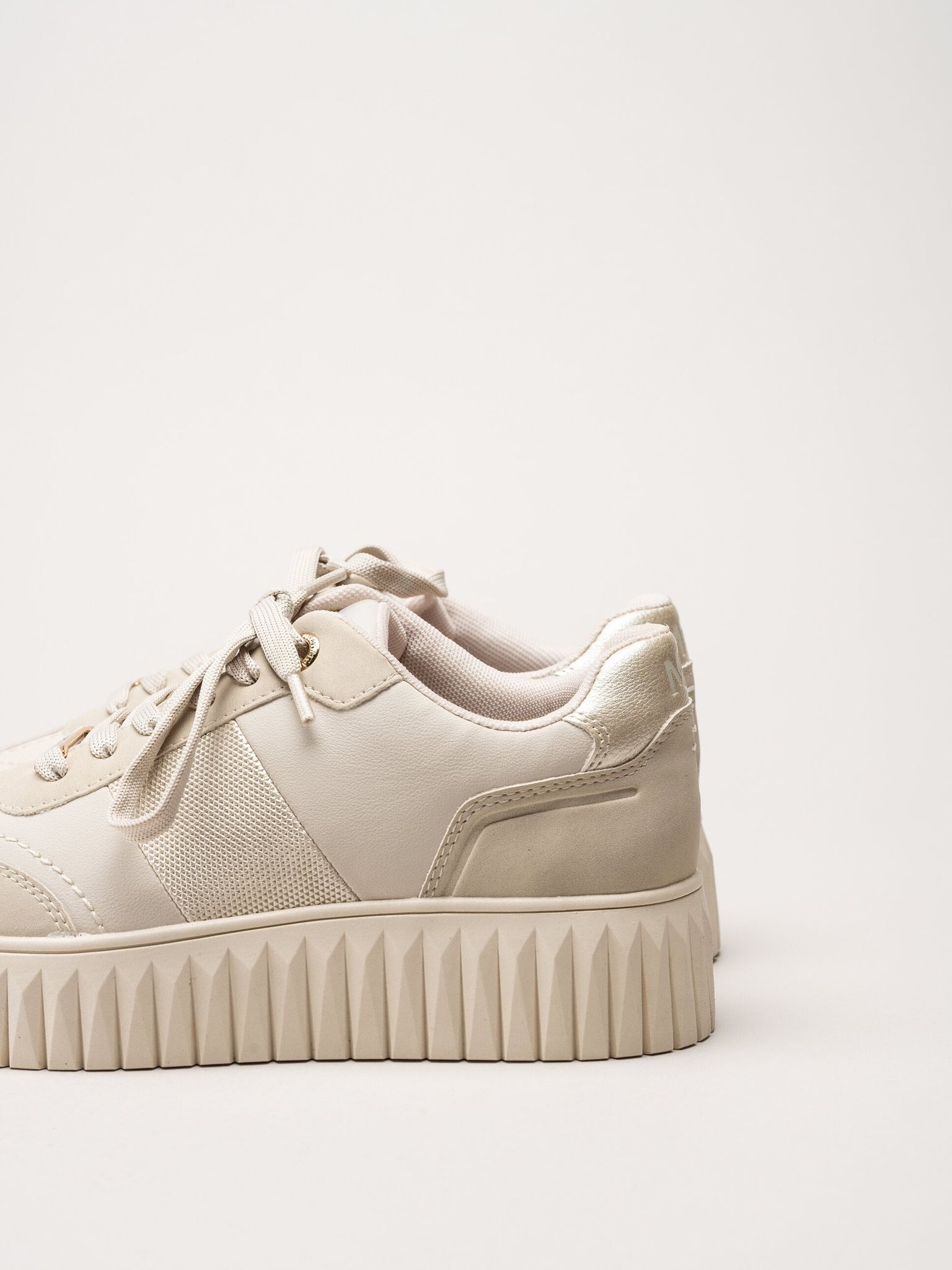Marco Tozzi - Beige sneakers i skinnimitation