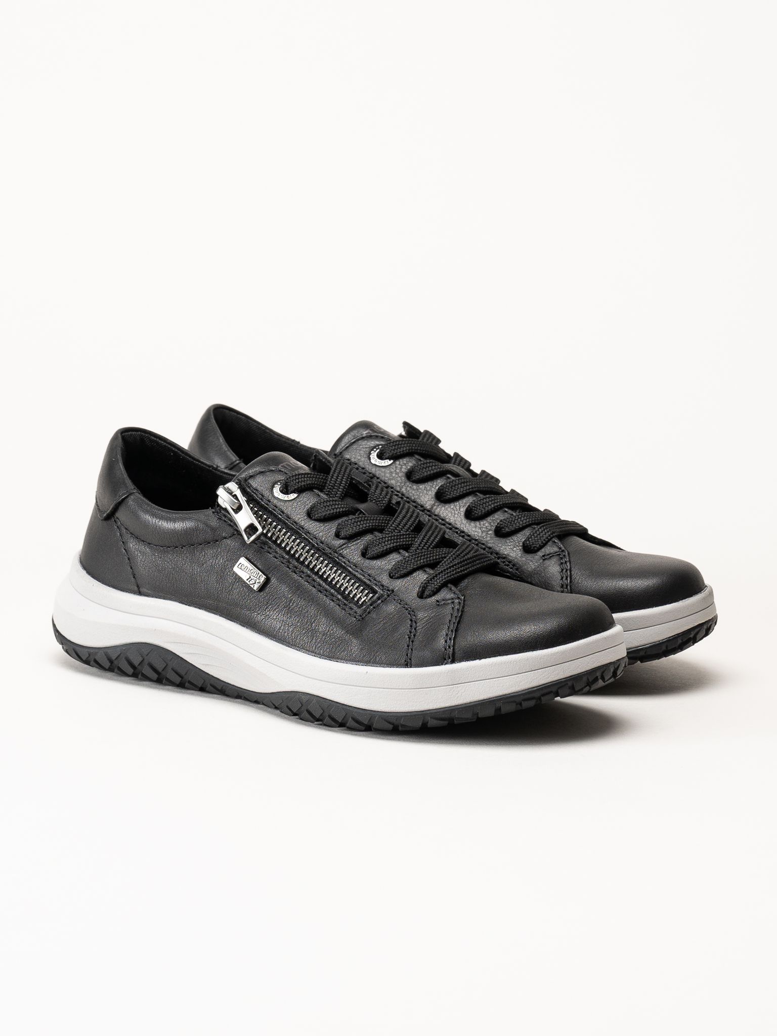 Remonte - Svarta sneakers i skinn