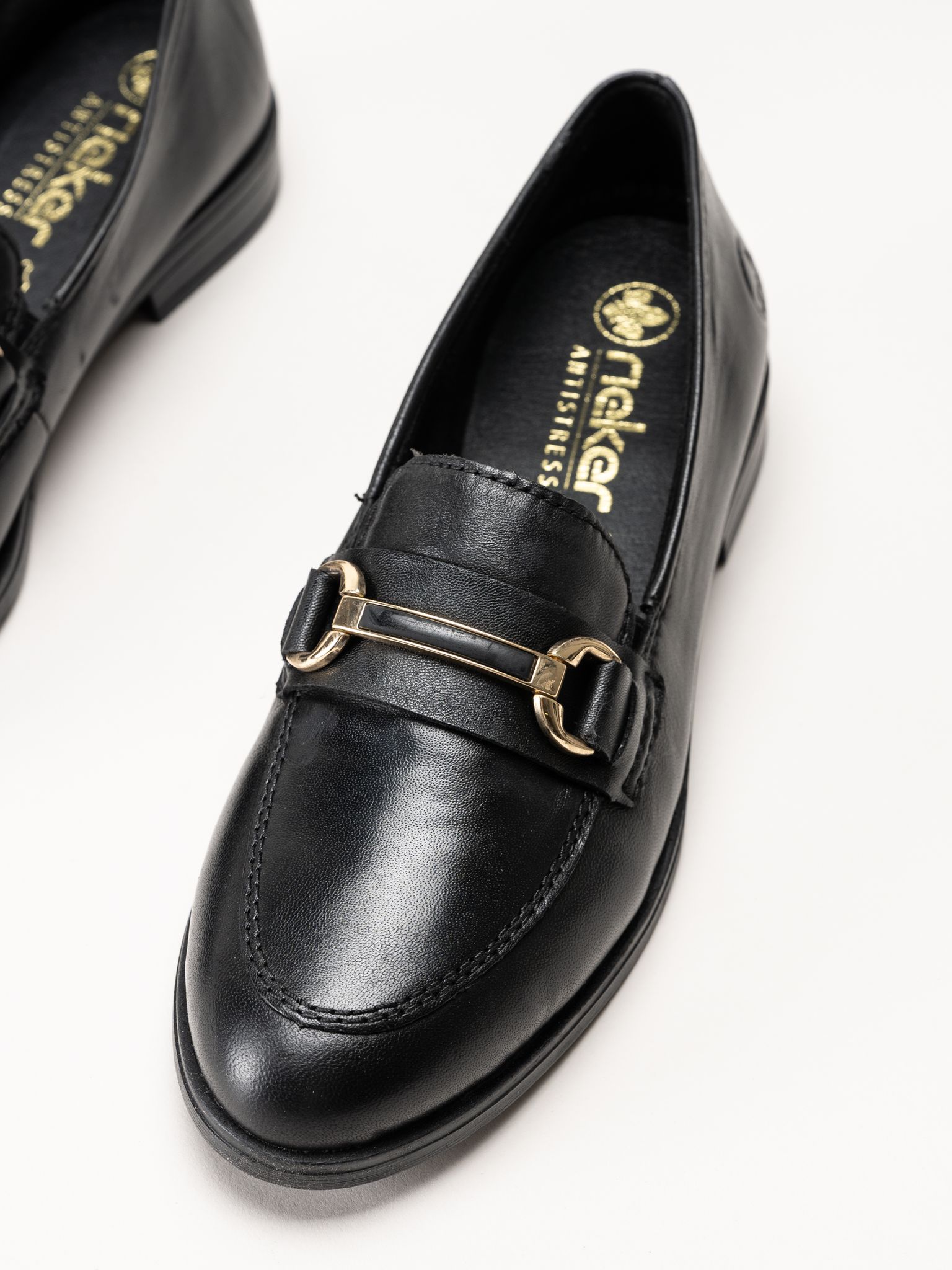 Rieker - Svarta loafers i skinn